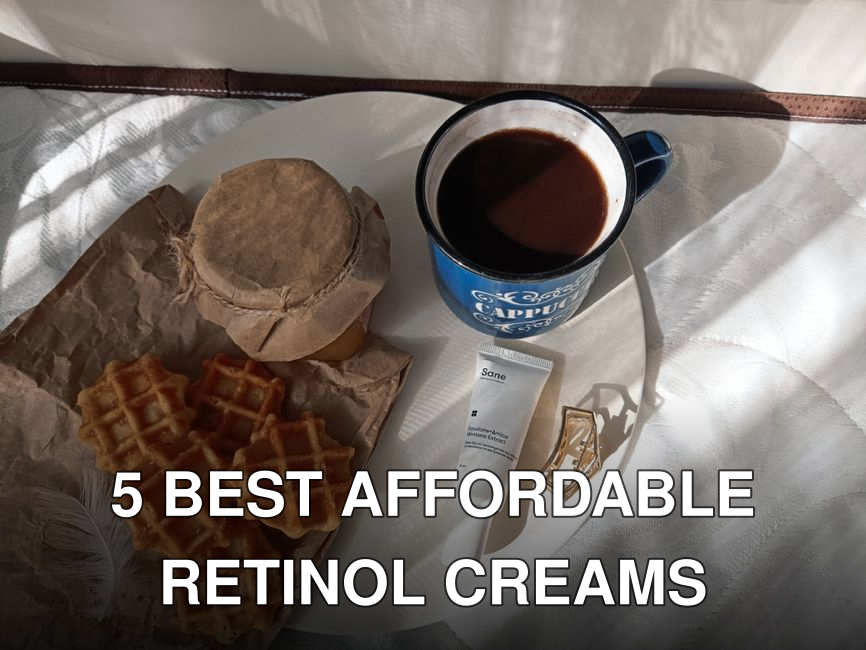 Flat lay of waffles, coffee, and personal items in a cozy morning setting.