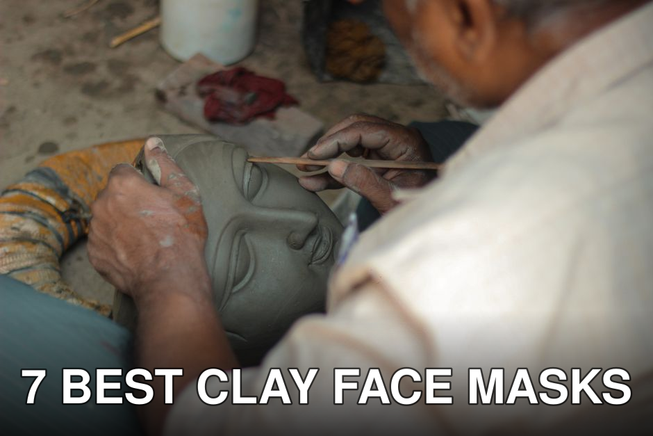 Artisan sculpting a clay face with precision. Close-up of skilled craftsmanship.