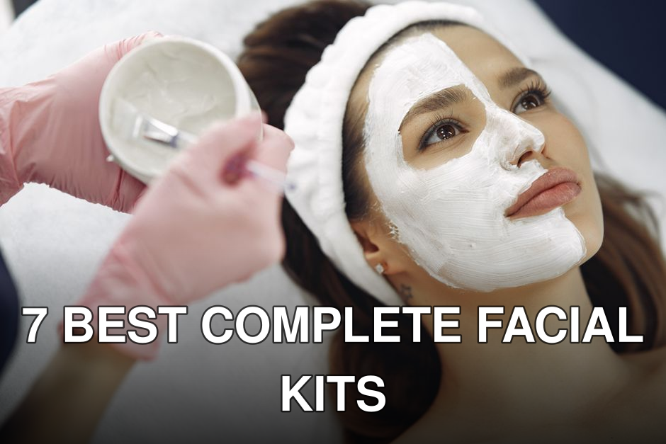From above closeup of crop faceless cosmetologist applying white clay mask with brush to female clients face during procedure in spa center