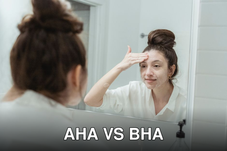 Young woman applying facial cream while looking at her reflection in the bathroom mirror.