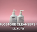 Two bottles of Sesderma Salises foaming cream against a pink backdrop.