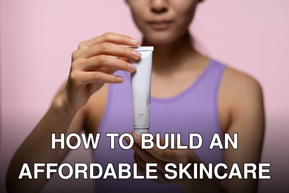 A woman in a purple tank top holds a skincare cream against a pink background in a studio setting.