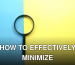 A magnifying glass lays on a split blue and yellow background in a flat lay style.