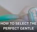 Disposable shaving razor with a teal handle on a white towel, perfect for personal care imagery.