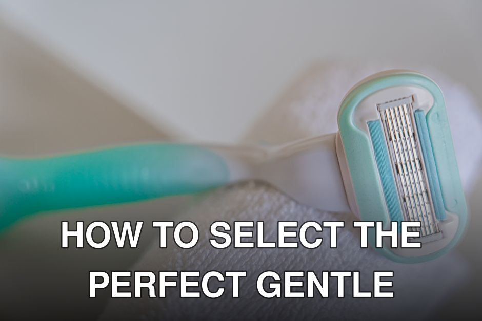 Disposable shaving razor with a teal handle on a white towel, perfect for personal care imagery.