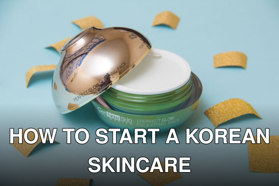 From above of stylish glass container with skincare cream placed on blue surface near scattered stickers