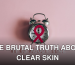 Alarm clock featuring an AIDS awareness ribbon on a pink background, symbolizing urgency and awareness.