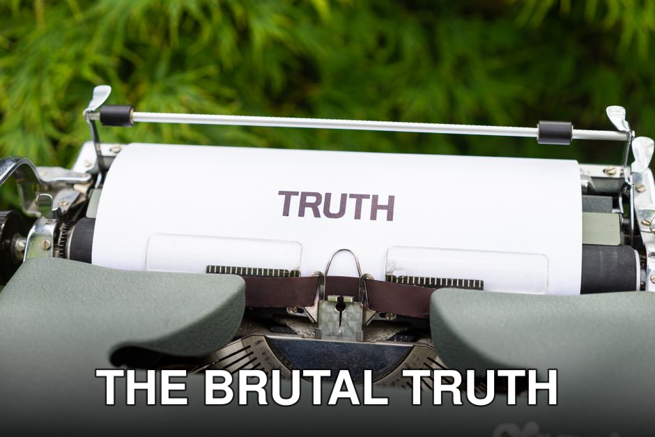 A vintage typewriter features the word 'TRUTH' on paper, set in a natural outdoor background.