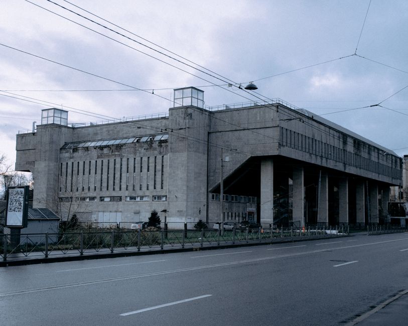 Explore a striking example of Soviet-era Brutalist architecture with this imposing urban building exterior.