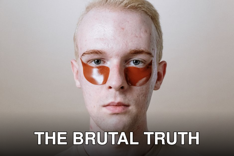 A man with orange eye patches looks directly at the camera, highlighting self-care and skincare.