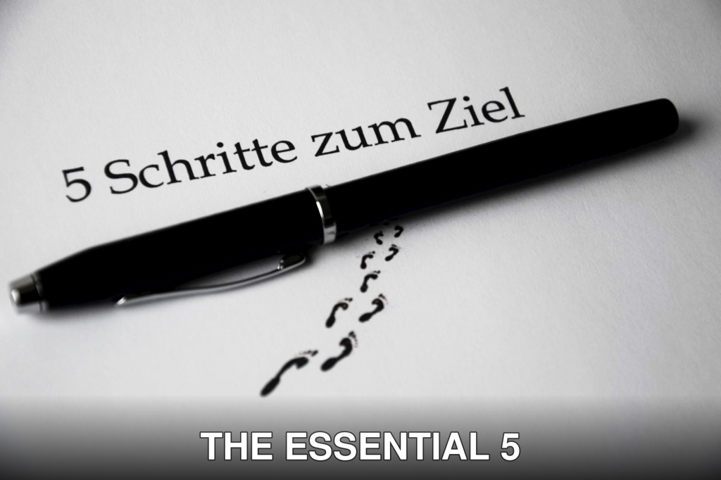 A black pen on a paper with text and footprint visual elements for a conceptual theme.
