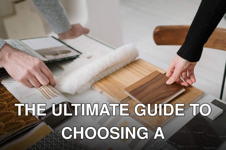 Hands selecting and comparing textile and wood samples for interior design.