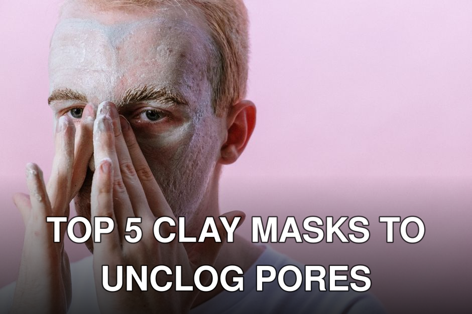 Young man applying clay mask as part of his skincare routine against pink background.