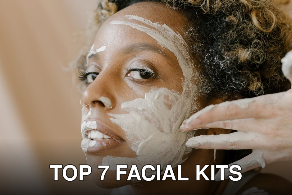 African woman applying a facial mask, emphasizing skincare beauty.
