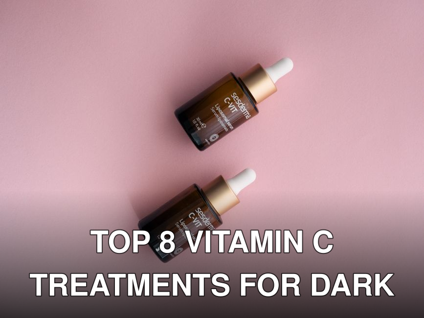 Two Sesderma C-VIT serum dropper bottles on a pastel pink surface.