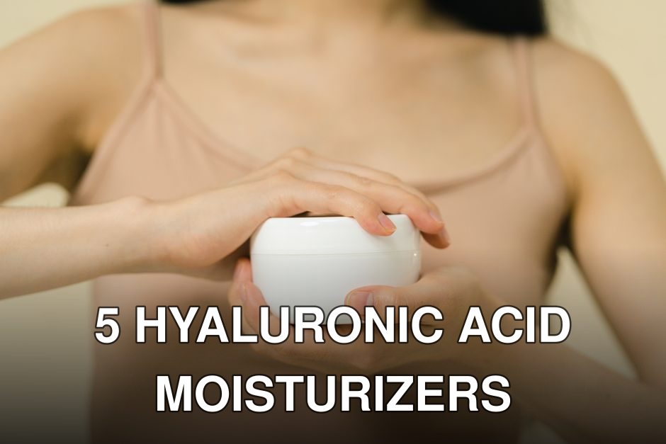 Close-up of a woman applying moisturizer with a focus on her hands and the cream container.