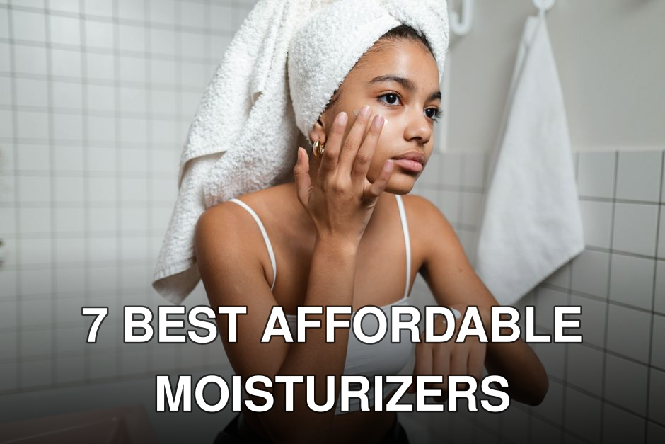 A young woman in a bathroom applying skincare cream with a towel on her head, focusing on self-care.