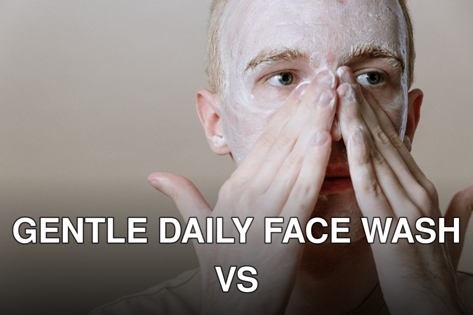 A young man applies skincare cream to his face, focusing on freshness and self-care in this indoor setting.