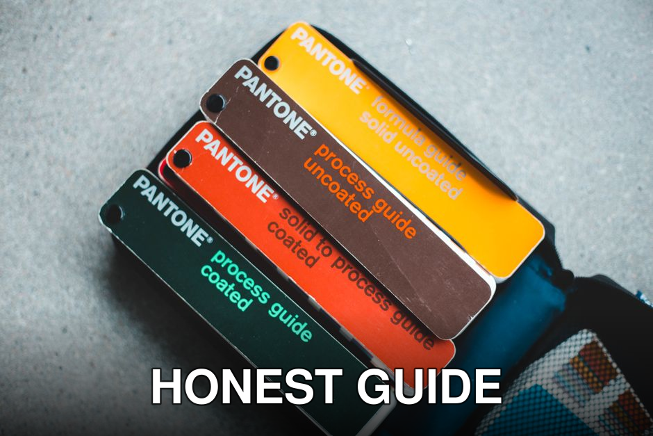 Top view of Pantone color guides showcasing vibrant shades for creative design projects.