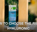 Eucerin DermatoCLEAN Hyaluron toner bottle surrounded by wooden frame and plants.