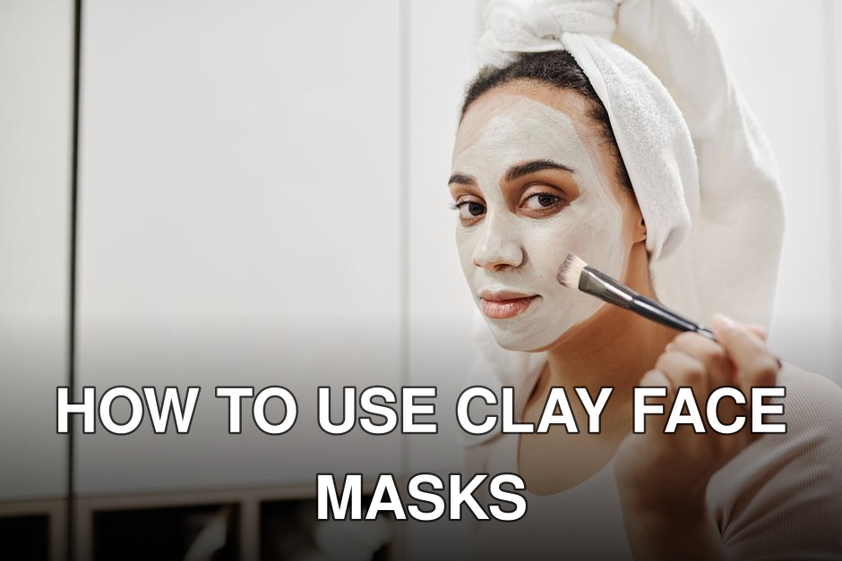 Adult woman using a makeup brush to apply a facial clay mask as part of her skincare routine at home.