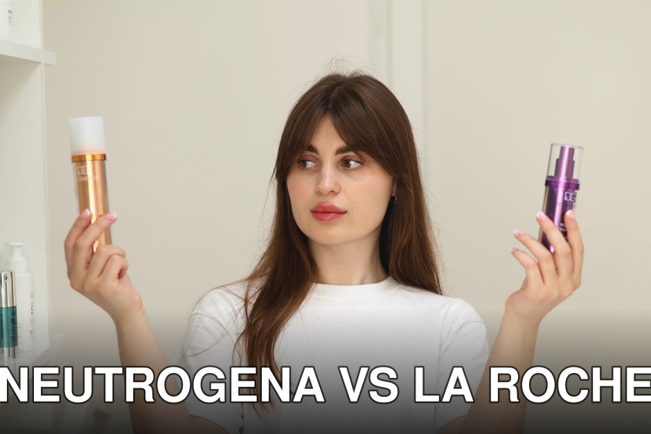 A young woman compares two cosmetic products while standing indoors, unsure of which to choose.