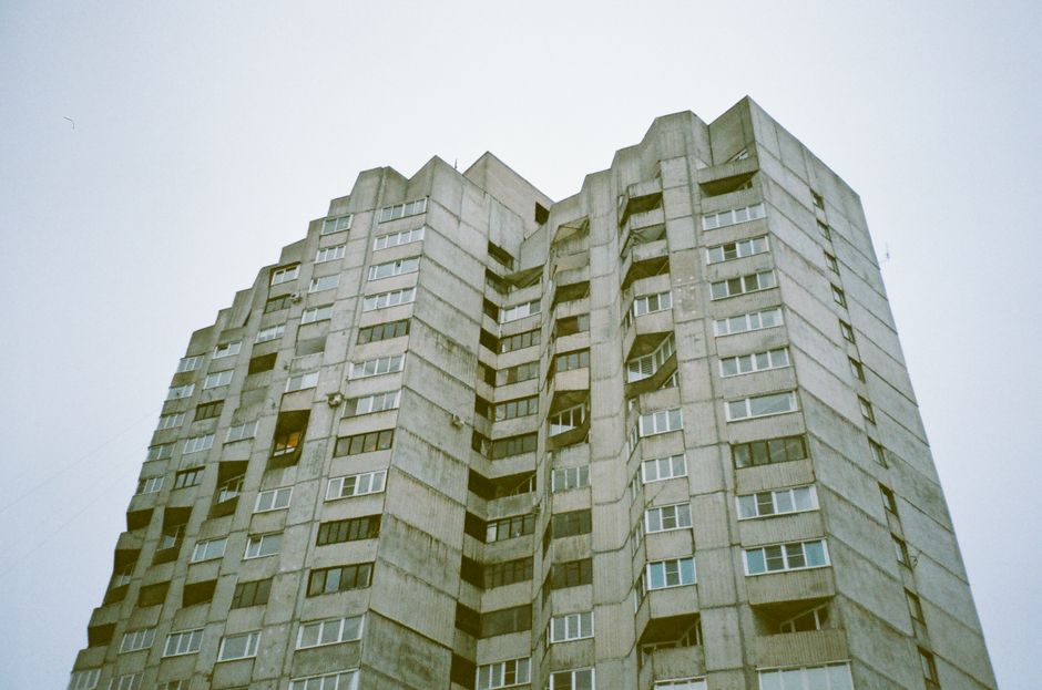 Low angle view of a Brutalist apartment building showcasing urban architectural design.