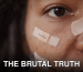 Close-up of a woman's face with band-aids featuring text, reflecting beauty and self-image themes.
