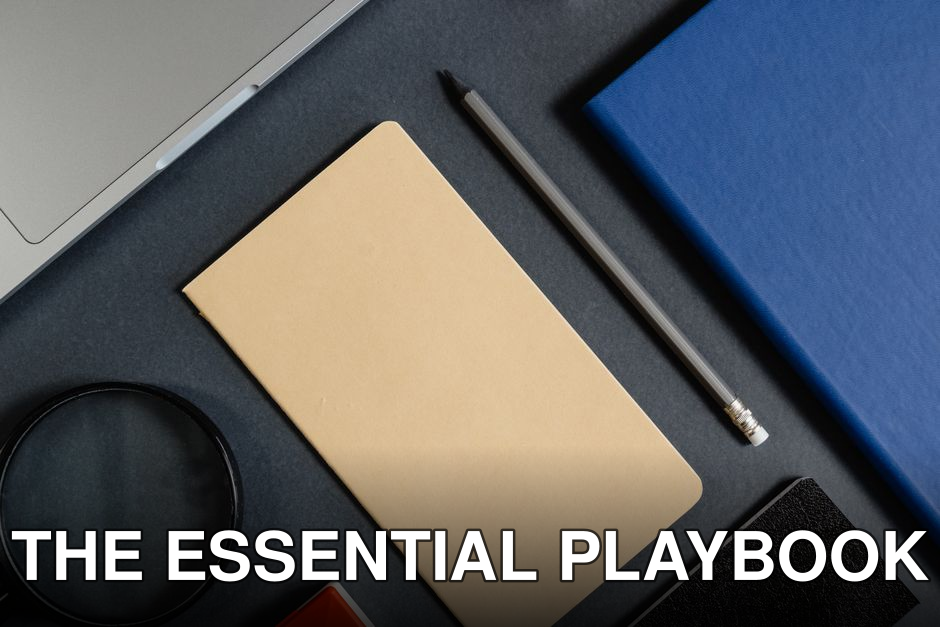 Flat lay of office stationery items with a minimalist design on a dark background.