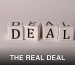 Close-up of white cubes with black letters spelling DEAL on a plain background.