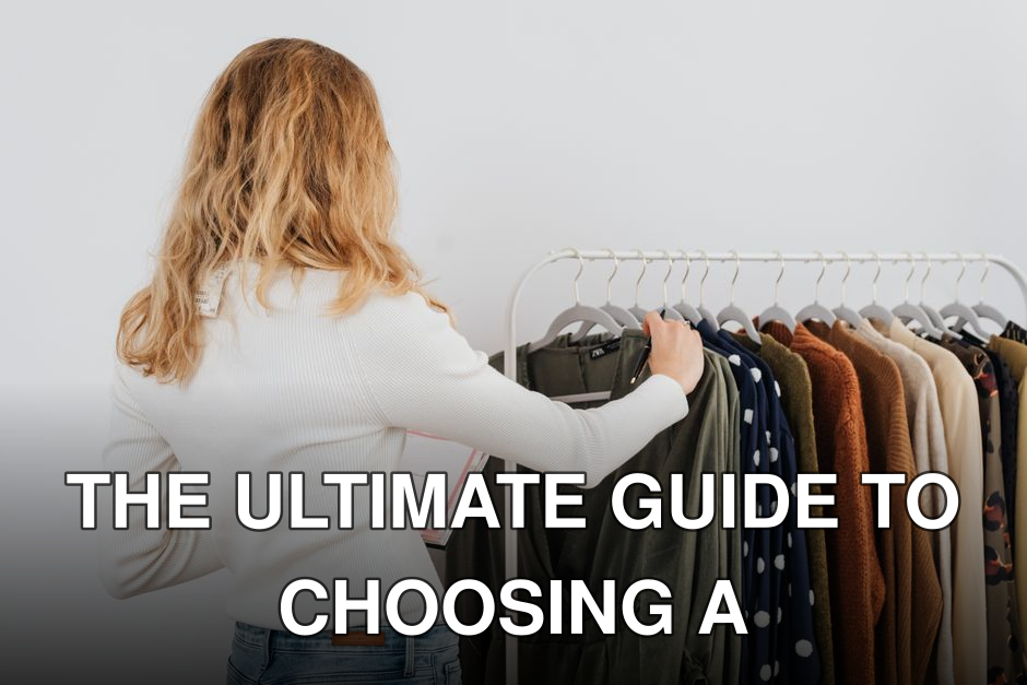 Back view of a woman browsing clothes on a rack in a boutique store.