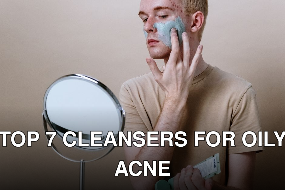 Young man applying clay mask for skincare routine indoors with a mirror.
